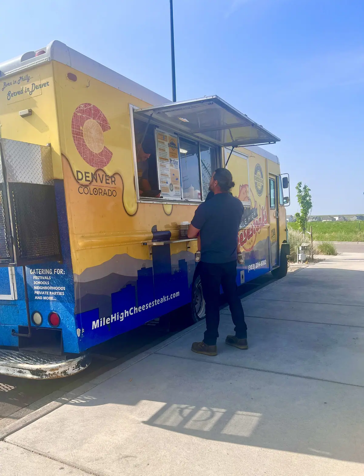 Mile High Cheesesteaks food truck at an event